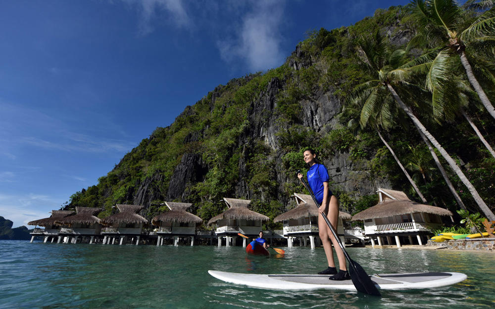 Stand-Up Paddle Boarding at El Nido Miniloc Island Resort, Philippines