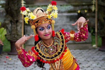 Balinese girl performs a welcome dance in Ubud