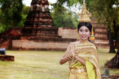Thai Woman in Costume Offering Wai Greeting, Thailand