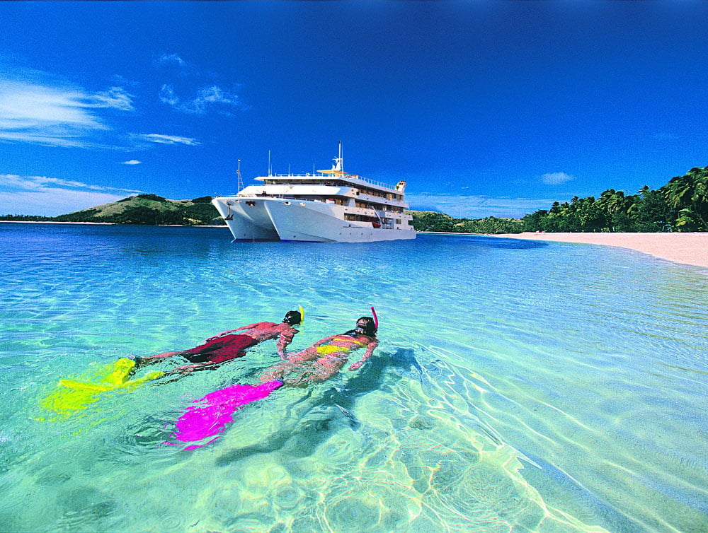 Snorkellers in Front of Fiji Princess
