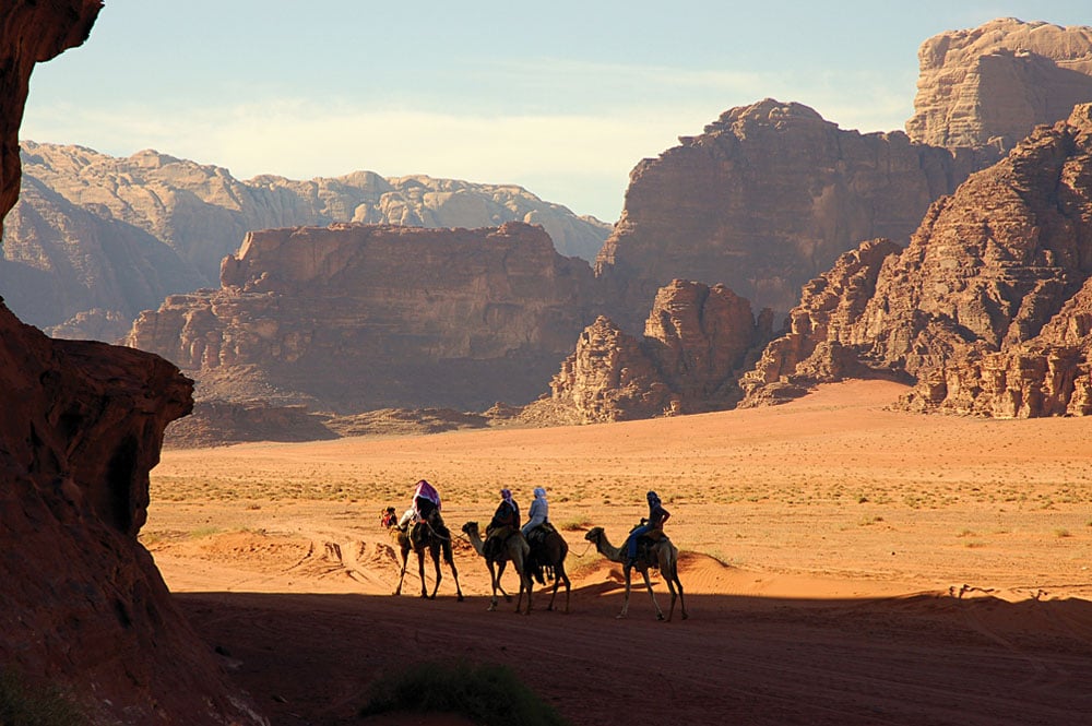 Taking a camel ride through Wadi Rum, Jordan