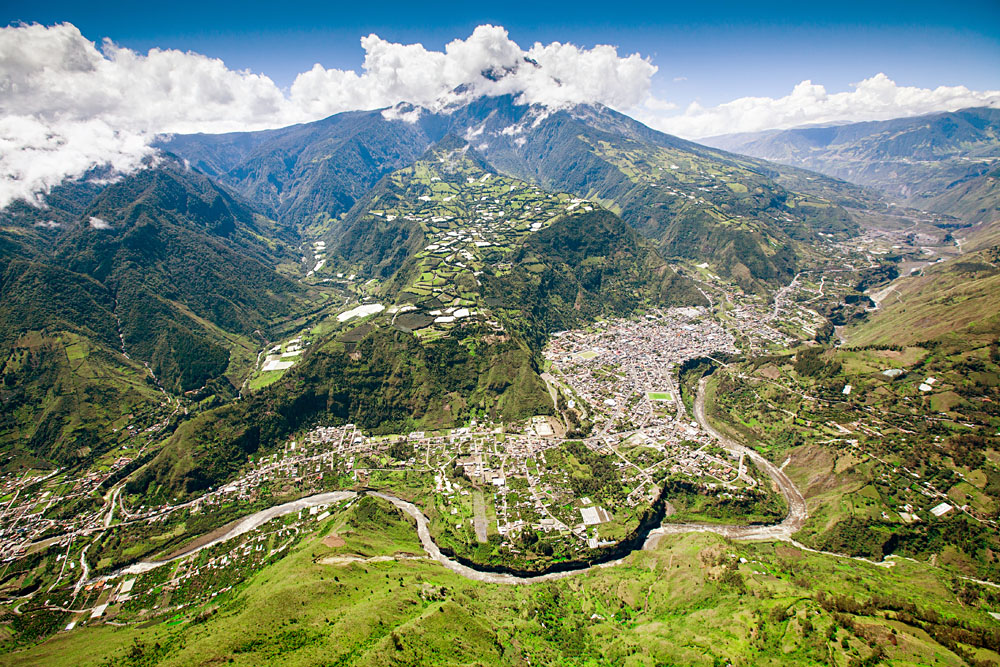 Aerial Shot of Banos with Tungurahua Volcano in Background, Ecuador