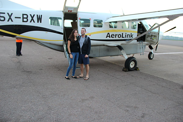Bronwyn and Husband in Front of Small Plane, Uganda