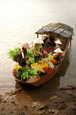Women Selling Flowers on a Boat, Vietnam