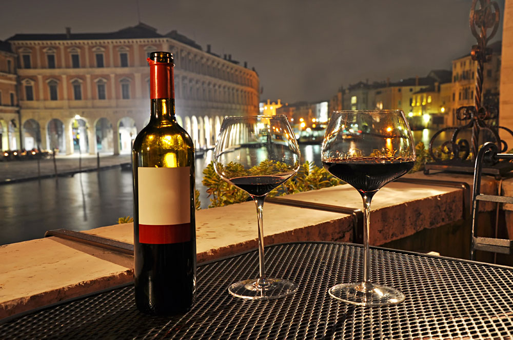 Glasses and Bottle of a Red Wine in Venice, Italy, Italy