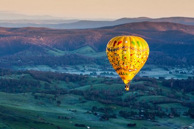 Hot Air Balloon Flight at Sunrise Over the Yarra Valley in Victoria, Australia
