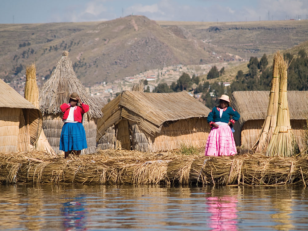 Local Women in Floating Uros Island on Lake Titicaca, Peru