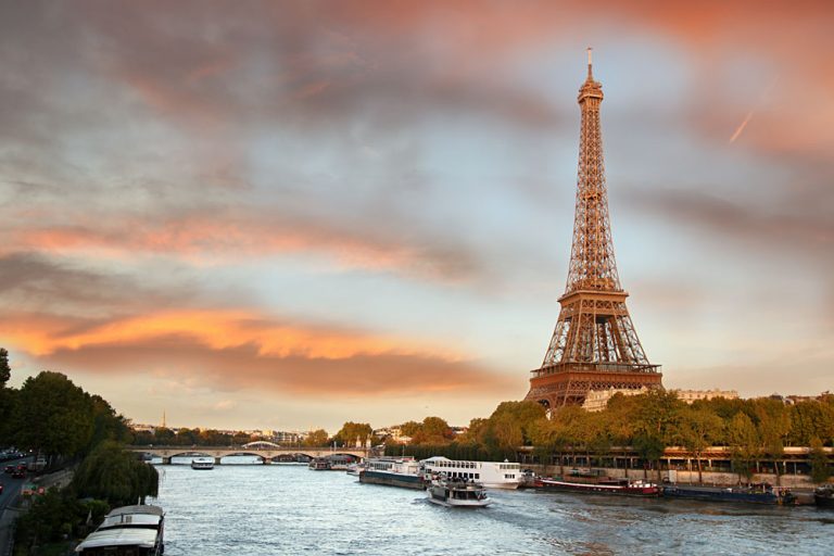Eiffel Tower with Boats on the River Seine in Evening Paris, France