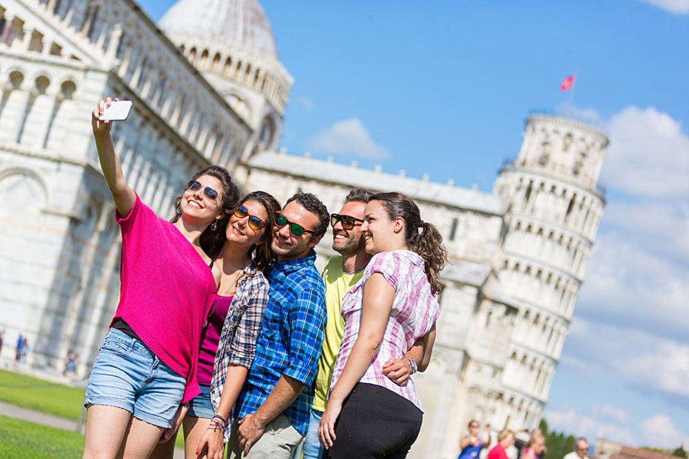 Group of Tourists Taking a Selfie in Pisa, Italy