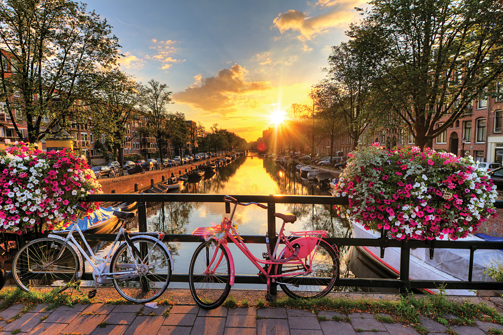 Beautiful Sunrise, Bicycles, and Bridge Over Amsterdam, The Netherlands