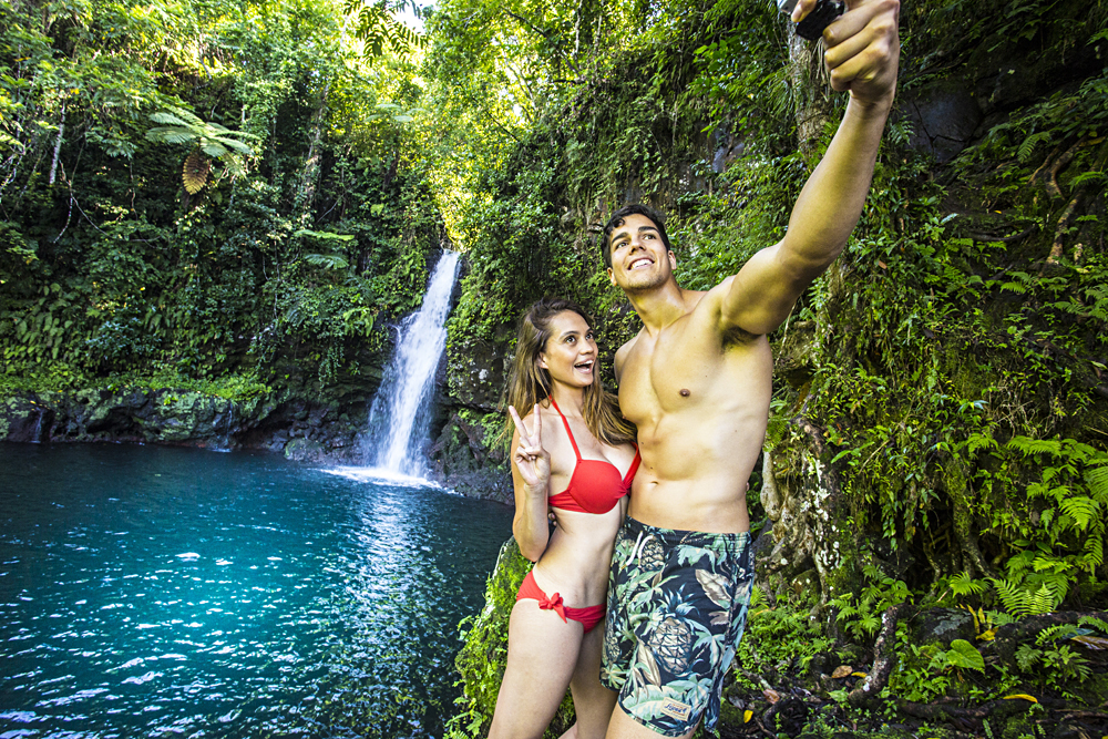 Couple Taking Selfies at Afu Aau Waterfall, Savaii, Samoa