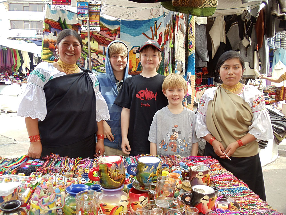 Don Forster - Boys with Market Stall Keepers in Otavalo Market, Ecuador