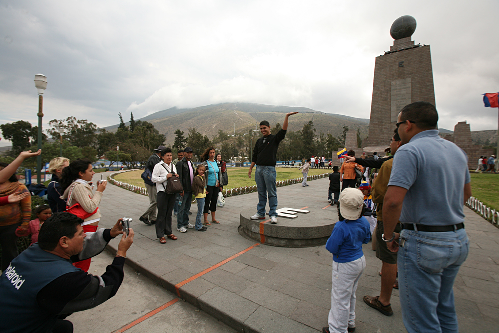 Don Forster - Demonstrating the Balance Walk on the Equator at Mitad del Mundo Near Quito, Ecuador