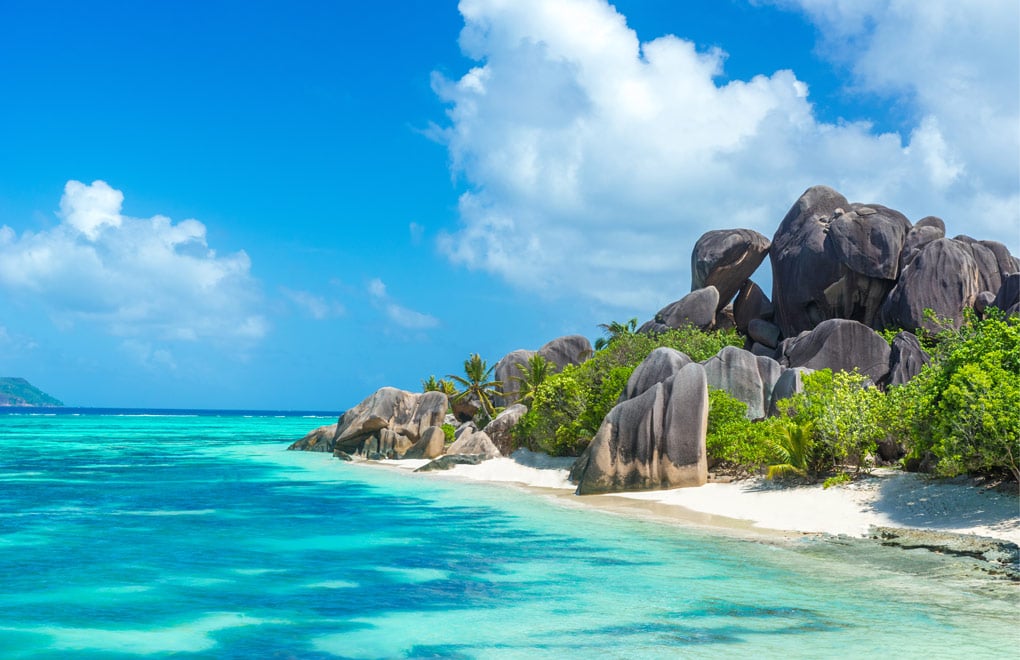 Anse Source d'Argent - granite rocks at beautiful beach on tropical island La Digue in Seychelles.