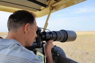 A professional photographer on an African safari in Kenya