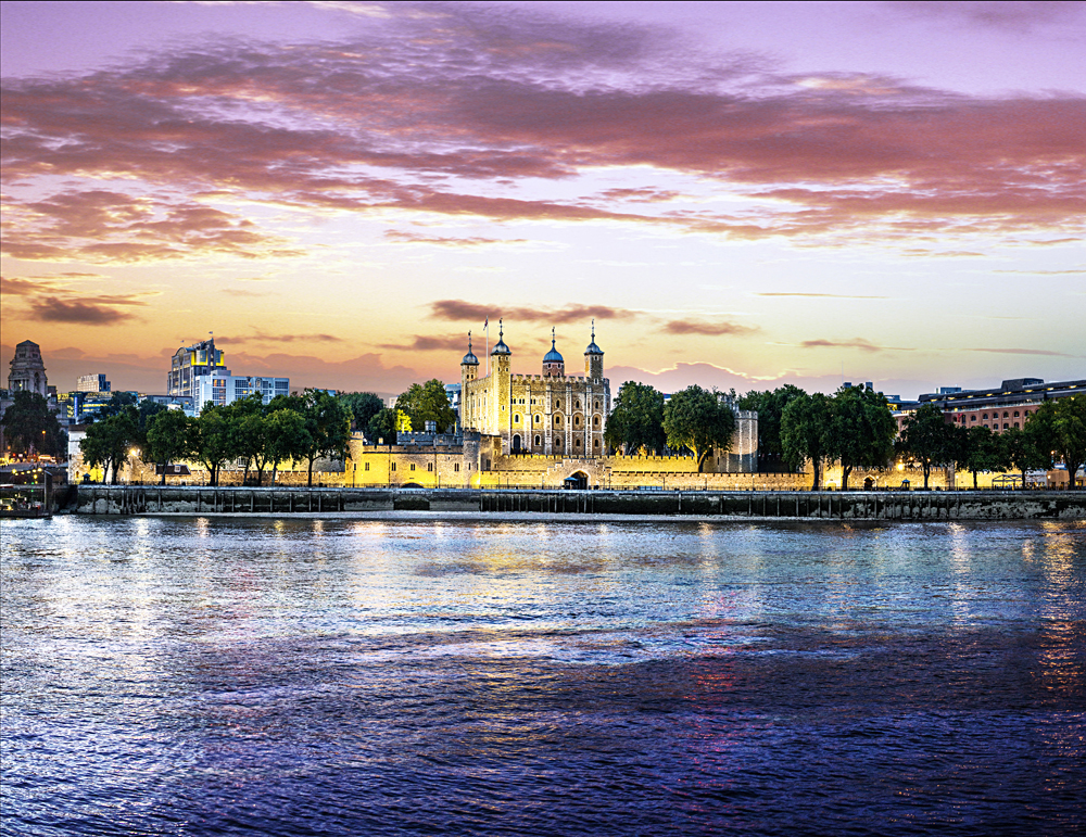 View of Tower of London at twilight from across the River Thames, London, England, UK | Photo Credit: VistBritain/Andrew Pickett