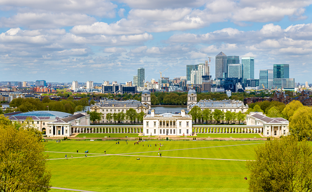 View of the National Maritime Museum in Greenwich and Canary Wharf in Background, London, England, UK