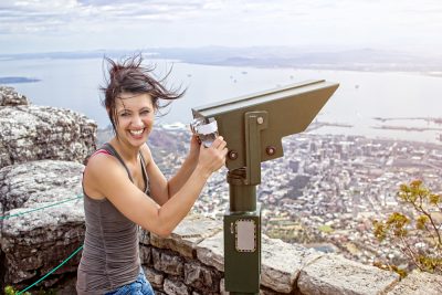 Smiling Woman on Table Mountain with Mountain Binoculars, Cape Town, South Africa