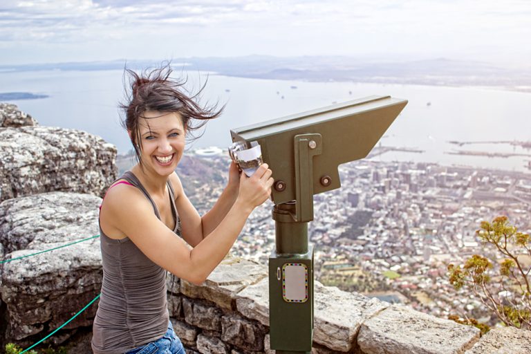 Smiling Woman on Table Mountain with Mountain Binoculars, Cape Town, South Africa