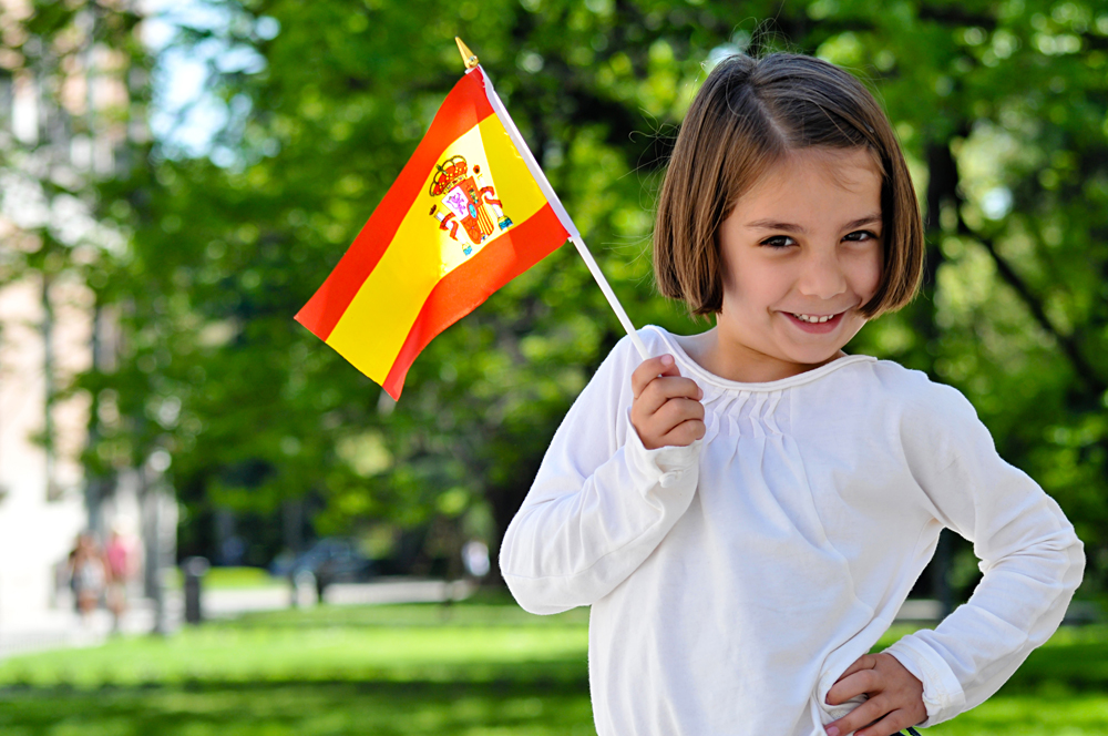 Young Girl With Spanish Flag
