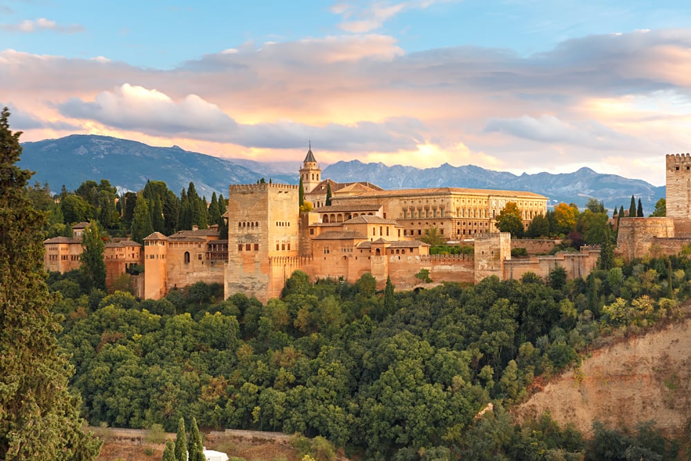 Palace and fortress complex of Alhambra during sunset in Granada, Andalusia, Spain