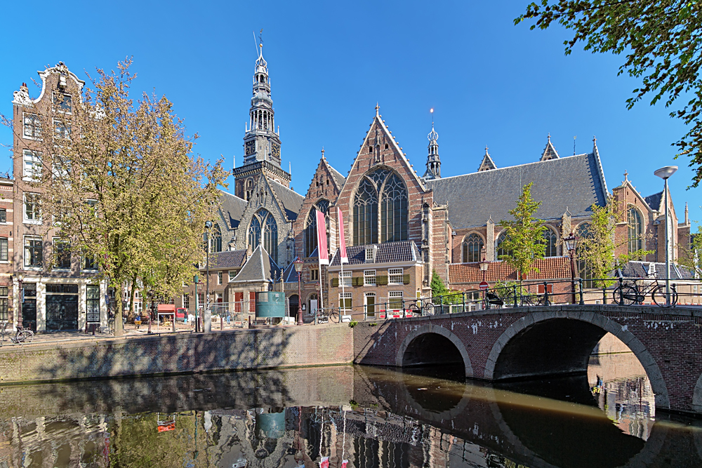 View of Oude Kerk (Old Church) from Across the Oudezijds Voorburgwal Canal in Amsterdam, Netherlands