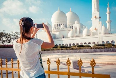 Woman Photographing Sheikh Zayed Grand Mosque, Abu Dhabi, United Arab Emirates (UAE)