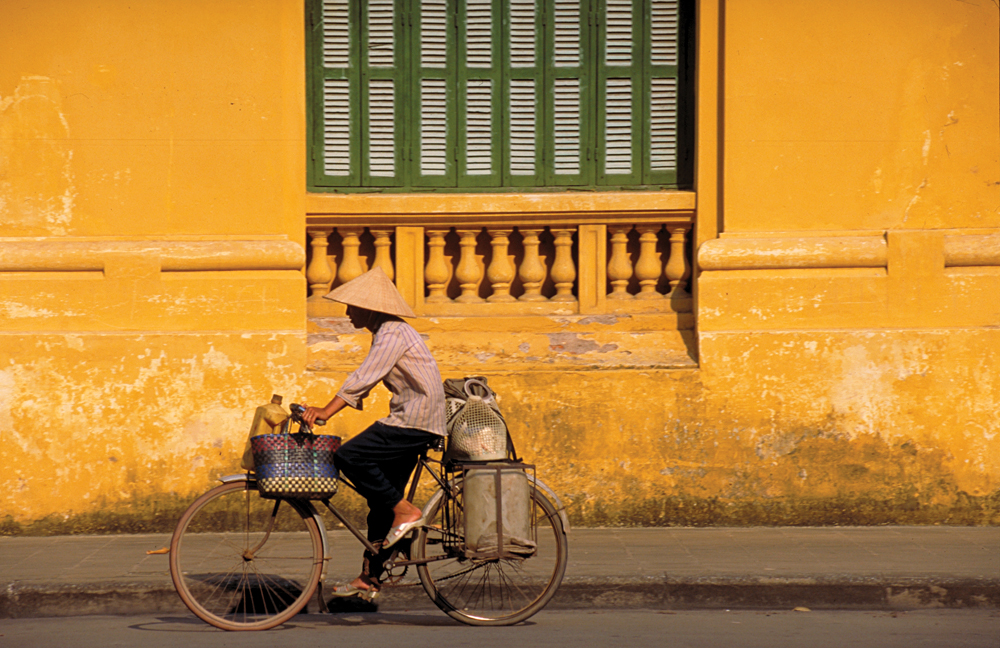 Cycling Along a Street in Hanoi, Vietnam