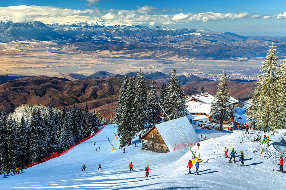 Wooden Chalets and Spectacular Ski Slopes in the Carpathians at Poiana Brasov Ski Resort, Transylvania, Romania