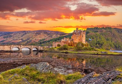 Eilean Donan Castle against sunset in Scottish Highlands, Scotland, UK (United Kingdom)