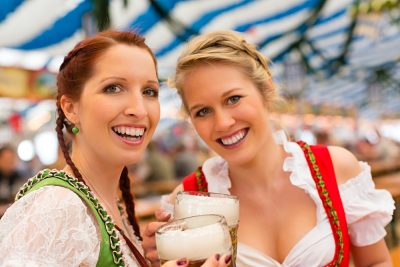 Young women in traditional Bavarian clothes at Oktoberfest, Munich, Germany