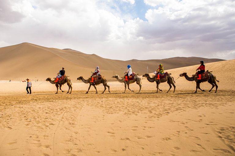 Camel Riding in the Deserts of Dunhuang, Gansu Province, China
