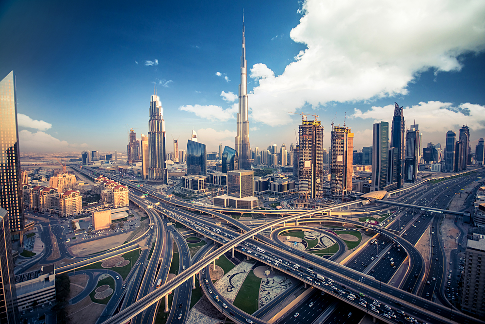 Dubai skyline with beautiful city close to it's busiest highway on traffic, United Arab Emirates (UAE)