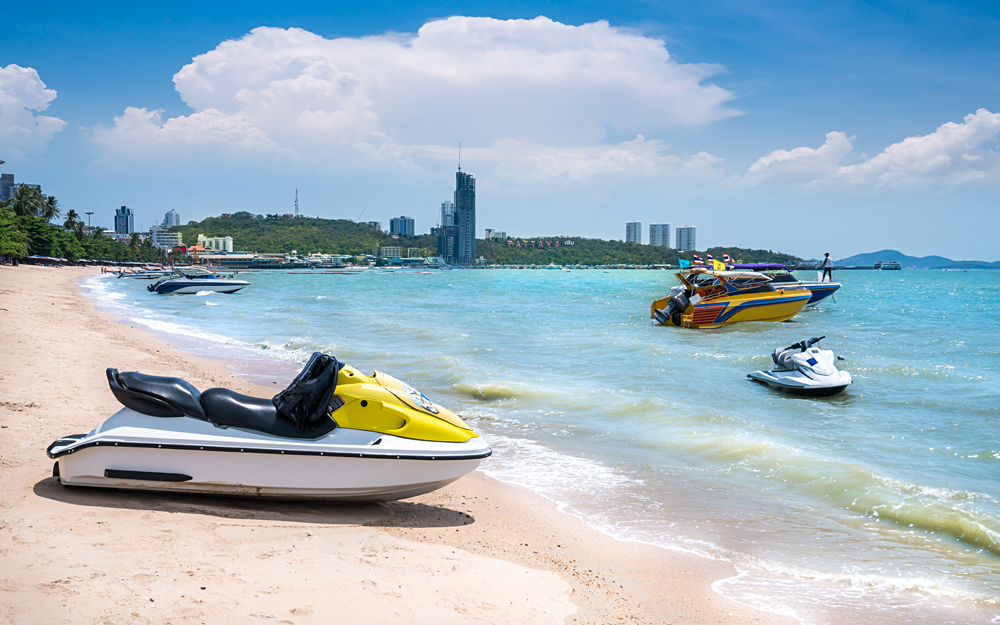 Speedboat and white sands of Pattaya Beach, Pattaya, Thailand