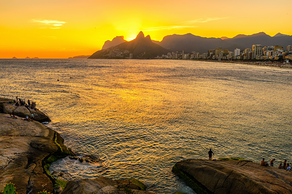 Sunset on Ipanema beach and mountain Dois Irmao (Two Brother) seen from Aproador, Rio de Janeiro, Brazil