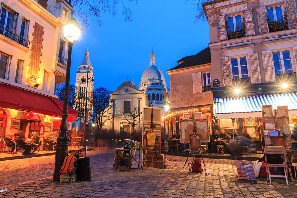 Beautiful evening view of the Place du Tertre and the Sacre-Coeur in Montmartre, Paris, France