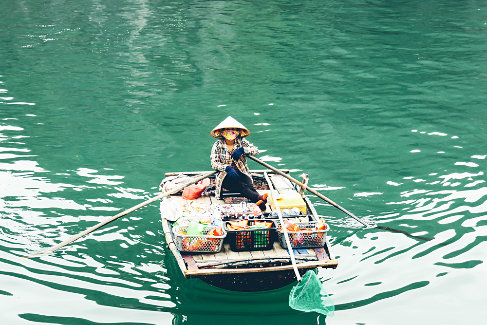 Michaela Trimble - Approaching Local Vendor Paddling to Our Boat, Halong Bay, Vietnam