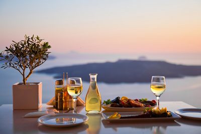 Romantic dinner for two at sunset in Santorini, Greece