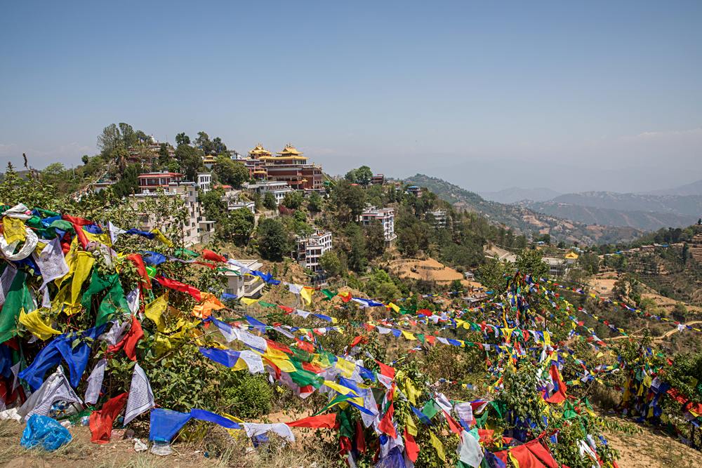 Colourful prayer flag mountain near ancient and holy Namobuddha monastery, Dhulikhel, Nepal