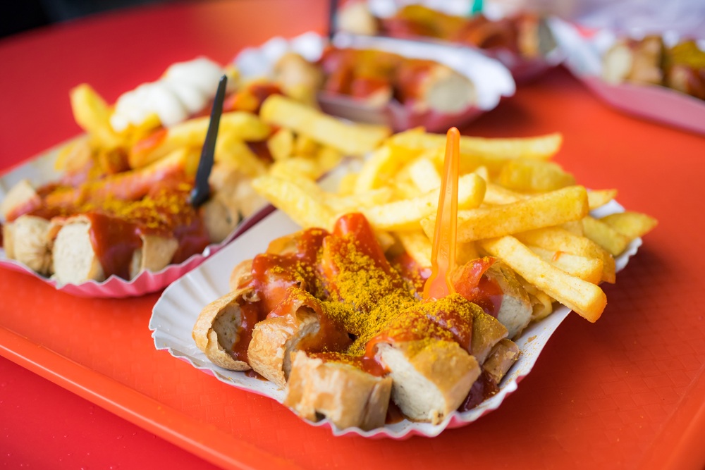 Currywurst with French fries in Berlin, Germany