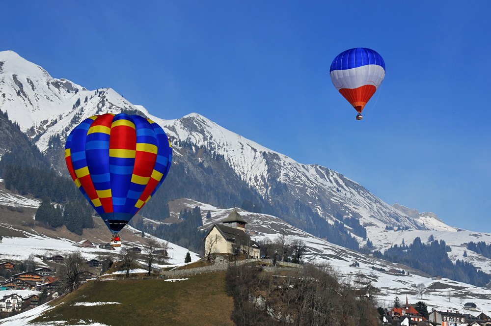 Hot air balloons over the Swiss Alps, Switzerland