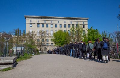 Line up of people waiting to get into the Berghain, one of the most exlclusive clubs, Berlin, Germany