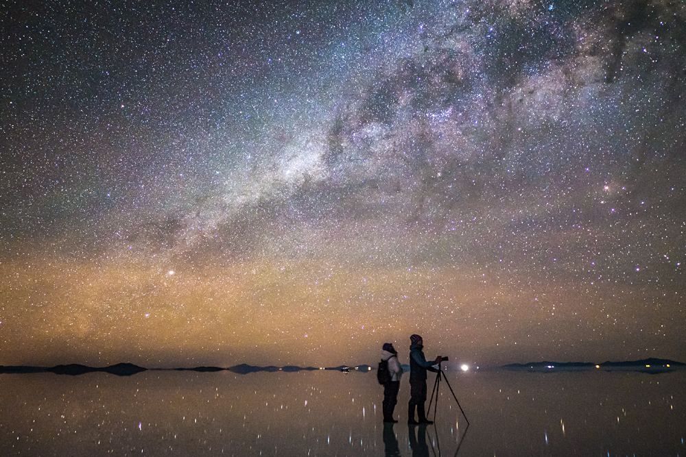 Couple Enjoying Milky Way at Uyuni Salt Flats, Bolivia Vacations