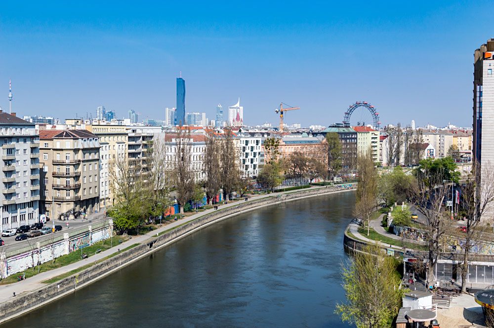 Cityscape around the Danube Canal looking toward Praterstern with the UNO city in the background, Vienna, Austria