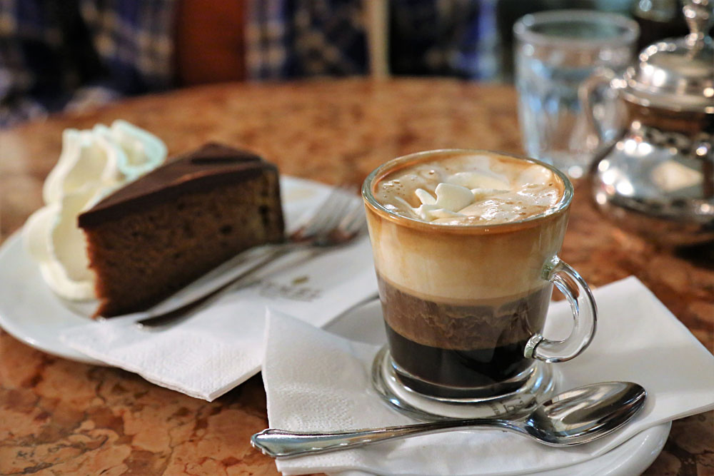 Coffee and cake (Sacherforte) at cafe in Vienna, Austria