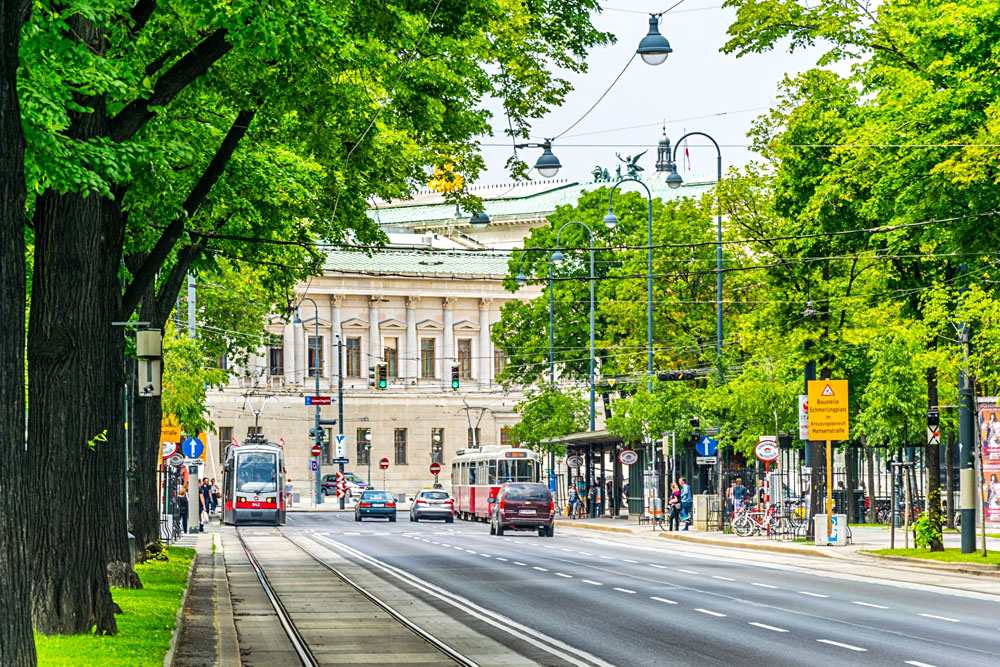 Wiener Ringstrasse with historic Parliament building in Vienna, Austria