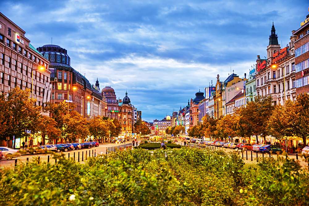 Buildings, people, and night life in Wenceslas Square, Prague, Czech Republic