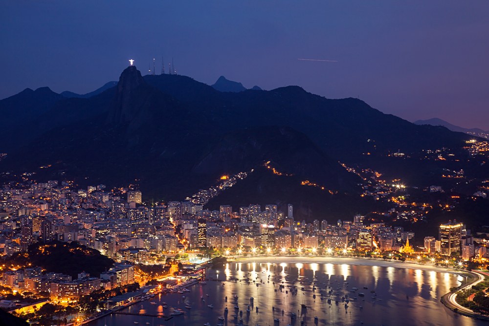 Night view of Sugarloaf Mountain and Botafogo in Rio de Janeiro, Brazil
