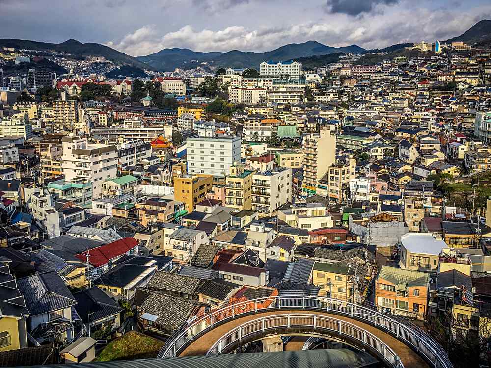 Aerial city landscape view of modern Nagasaki on Kyushu island, Japan