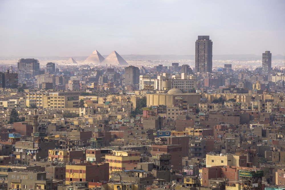 Cityscape view of Cairo, including Giza Pyramids, Egypt